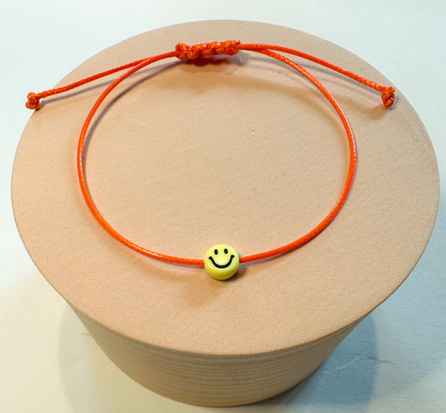 Orange Smiley Armband - Nylon & Perlen Armband